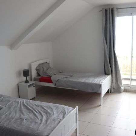 Le Sandivel Saint-Denis Bagian luar foto